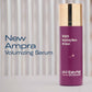 Purple skincare serum bottle with gold cap on a light background, featuring 'New Ampra Volumizing Serum' text.